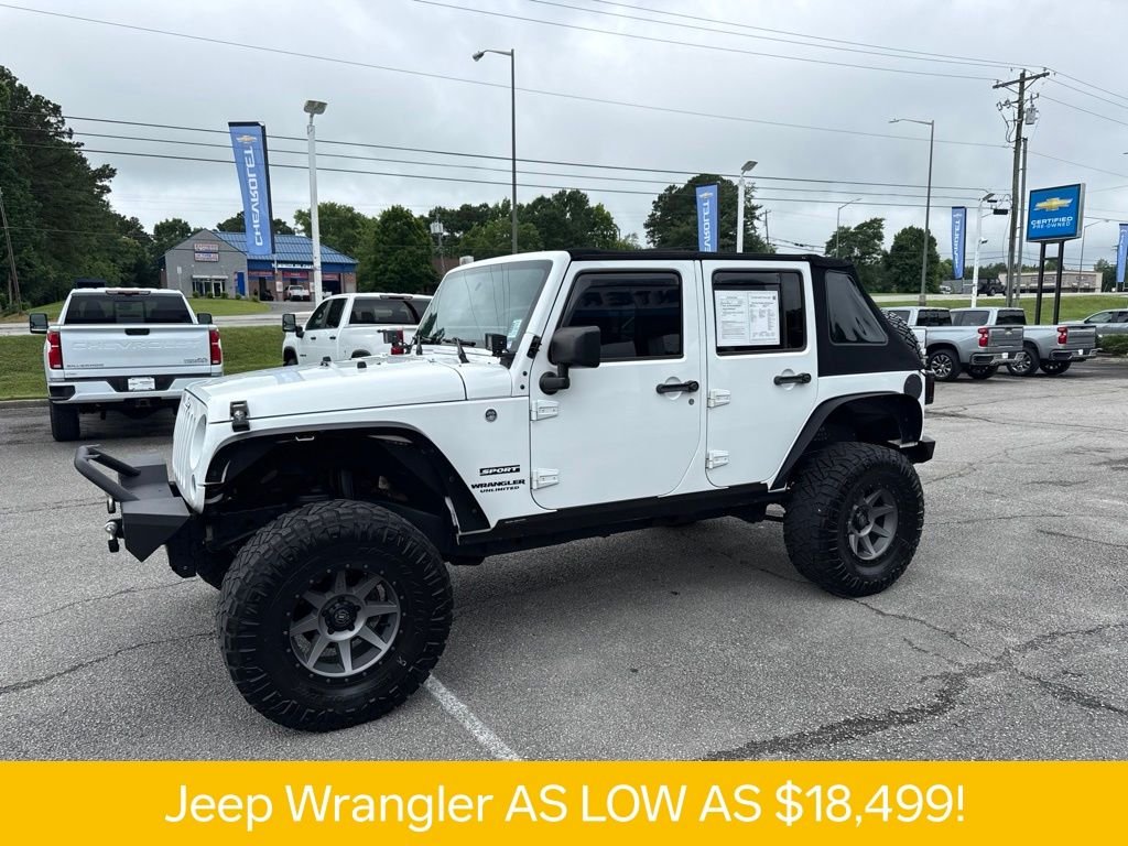 Used 2016 White Jeep Unlimited Sport image 2