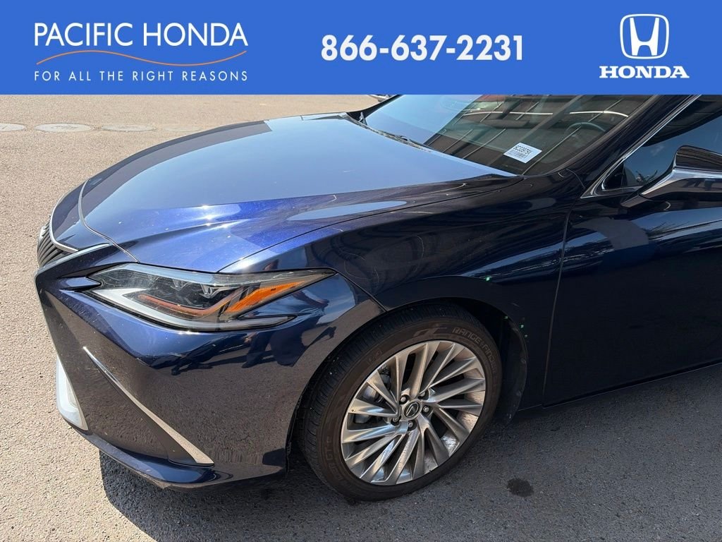 Used 2021 Blue Lexus 300h Luxury image 1