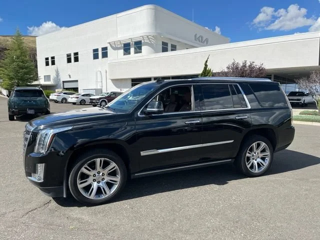 Used 2015 Black Raven Cadillac Premium image 1