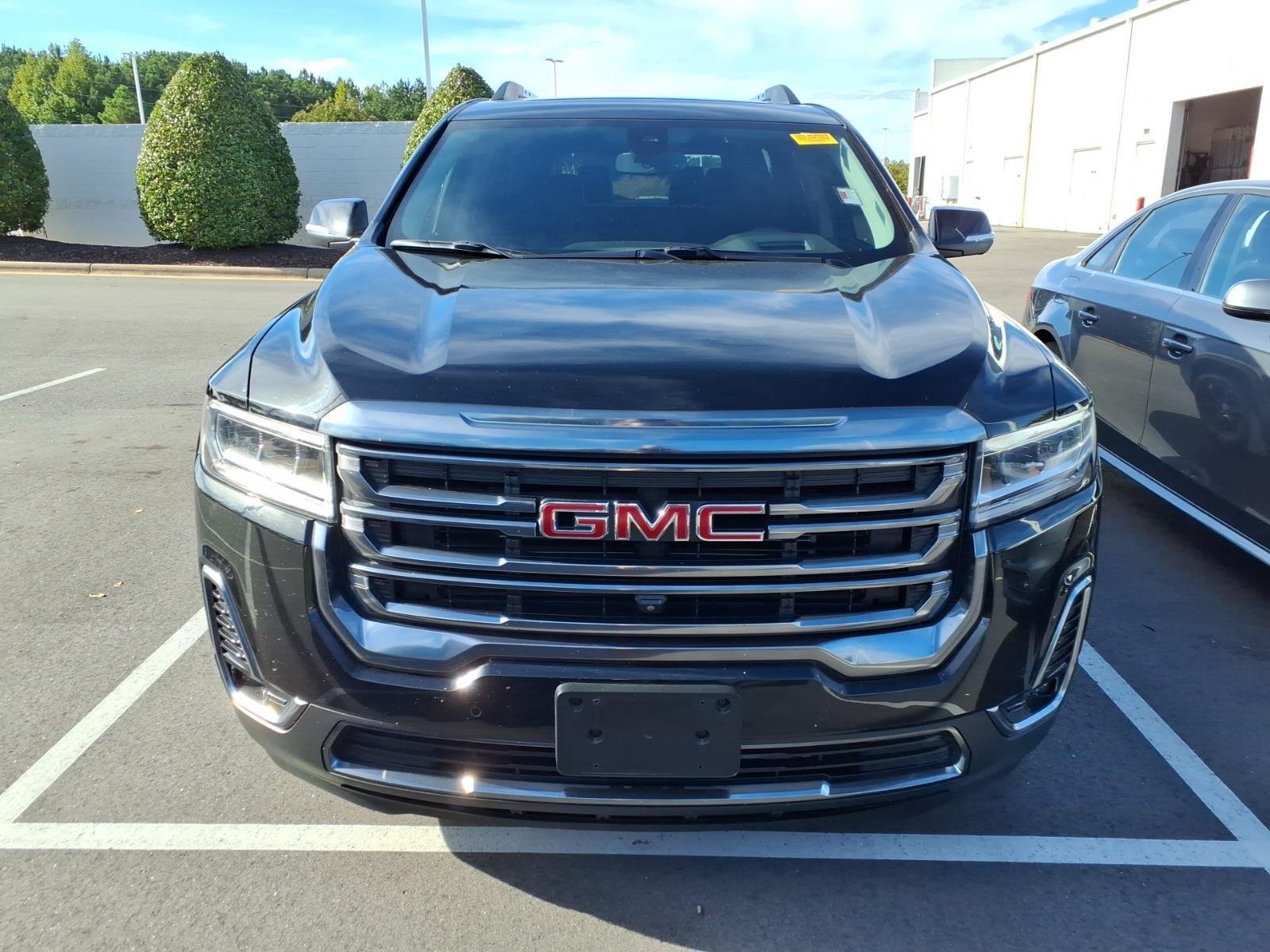 Used 2023 Ebony Twilight Metallic GMC AT4 image 6