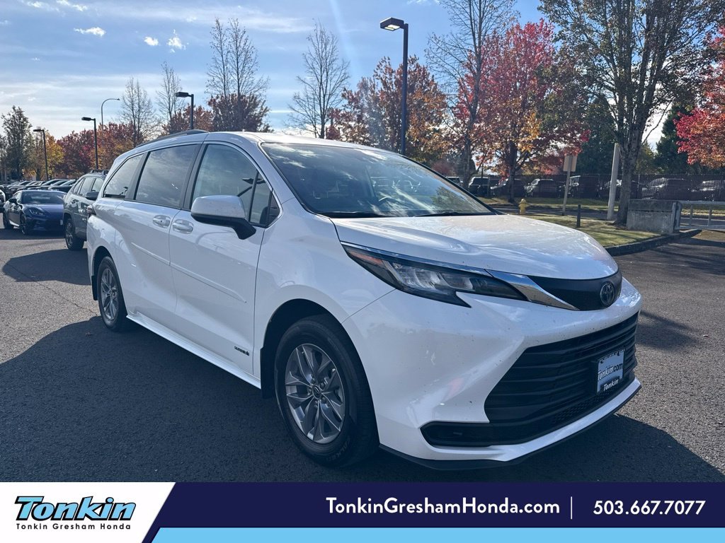 Used 2021 Super White Toyota LE image 1