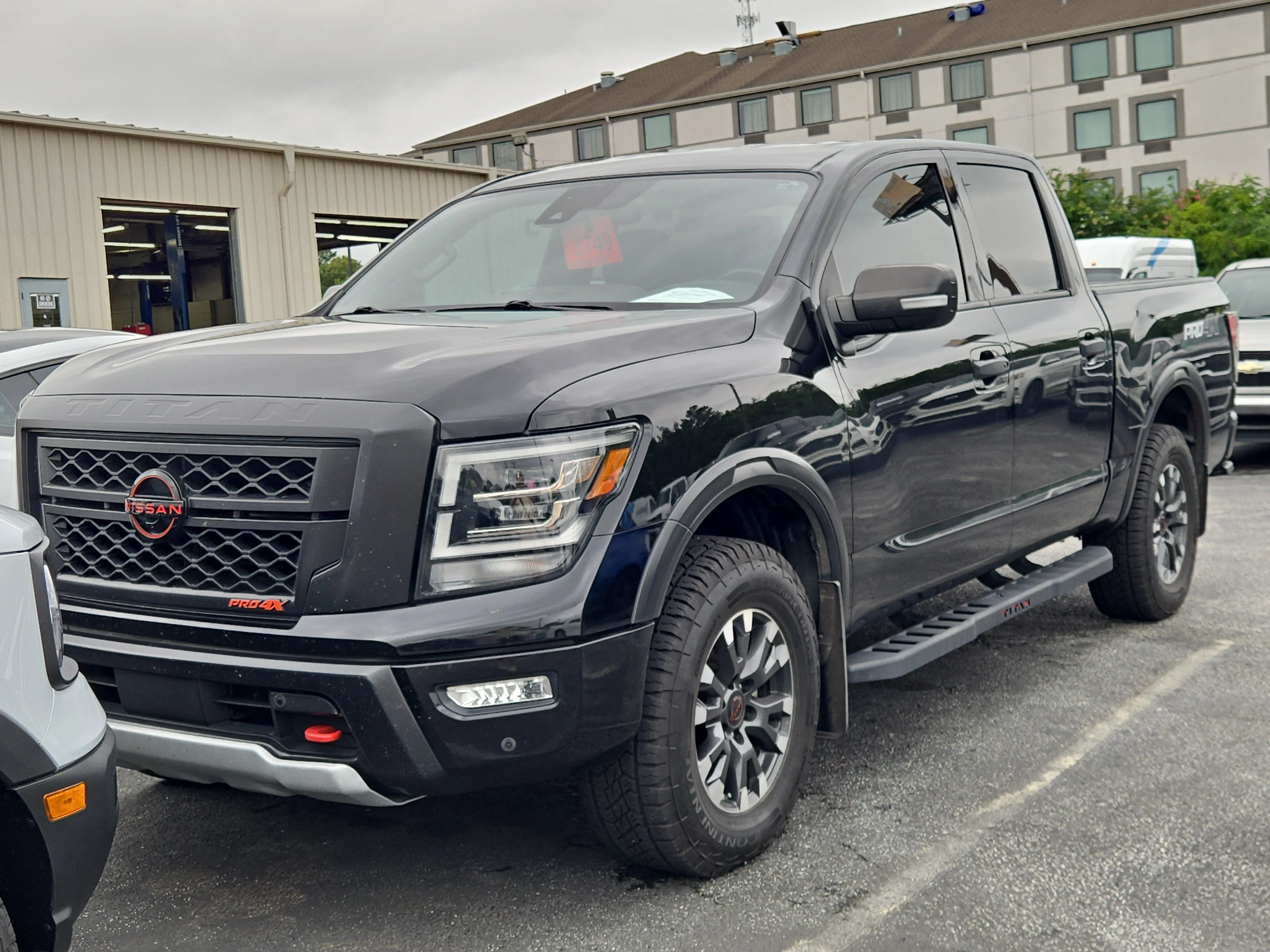 Used 2023 Super Black Nissan PRO-4X image 1