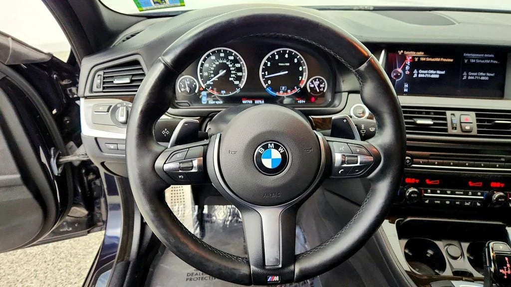 Used 2015 Azurite Black Metallic BMW 4dr Sdn 550i xDrive M Sport w/ Executive & Luxury Seating Pkgs image 14