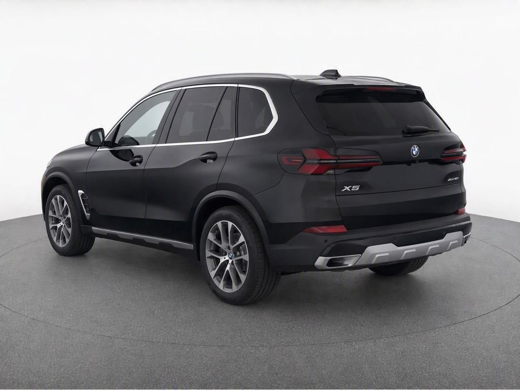 Certified Used 2025 Black Sapphire Metallic BMW xDrive40i image 4