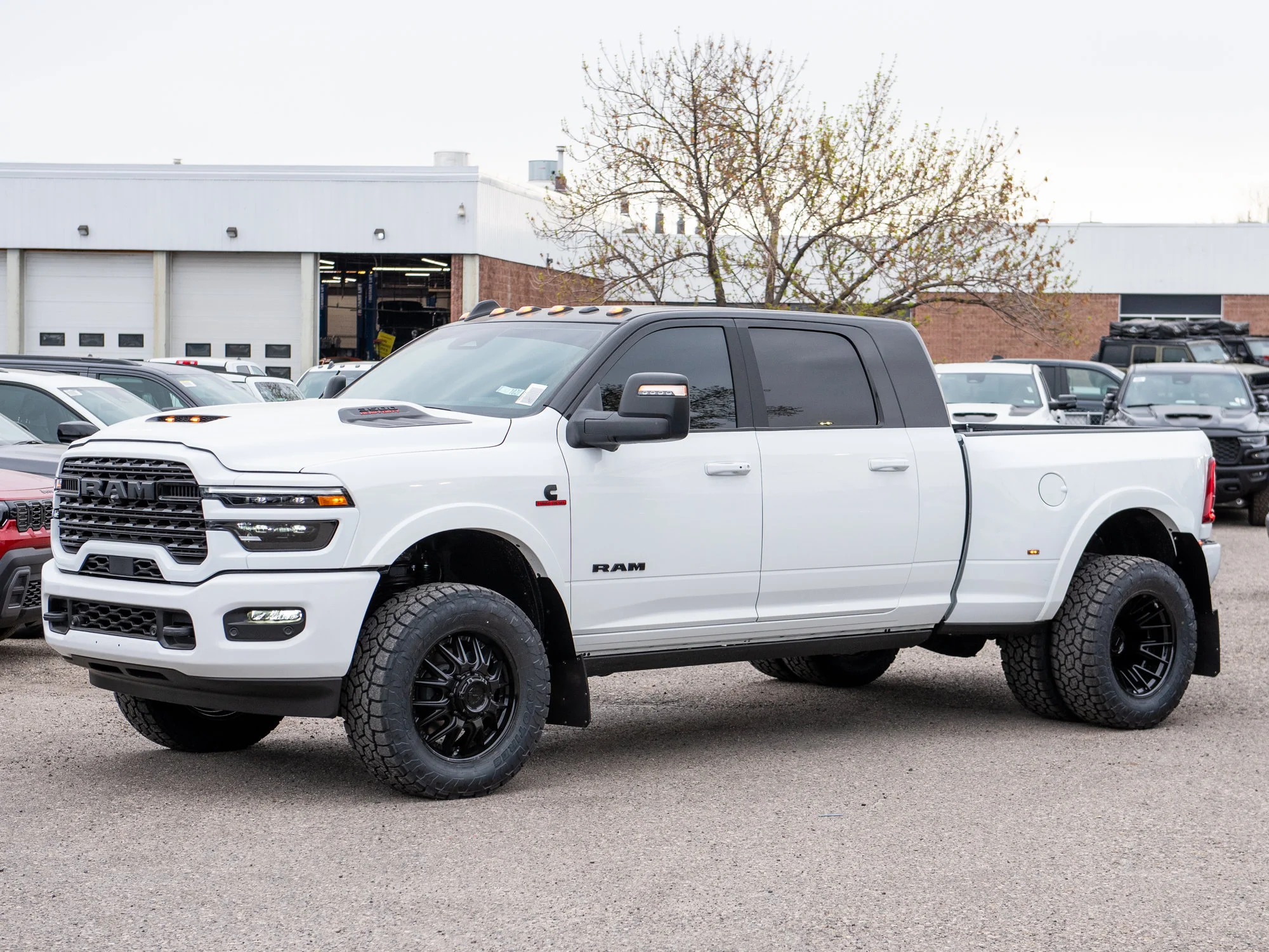 New 2026 White RAM Limited* Mega Cab, 2 Inch Lift, 35 Inch Tires, Fuel Wheels image 4