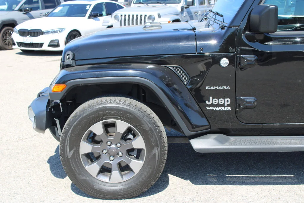 Used 2018 Black Jeep Unlimited Sahara image 7