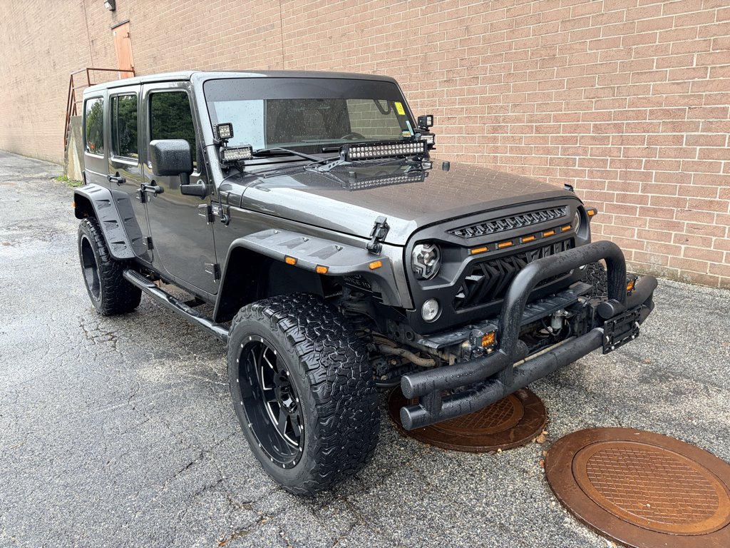 Used 2017 Granite Crystal Metallic Clearcoat Jeep Sport image 7