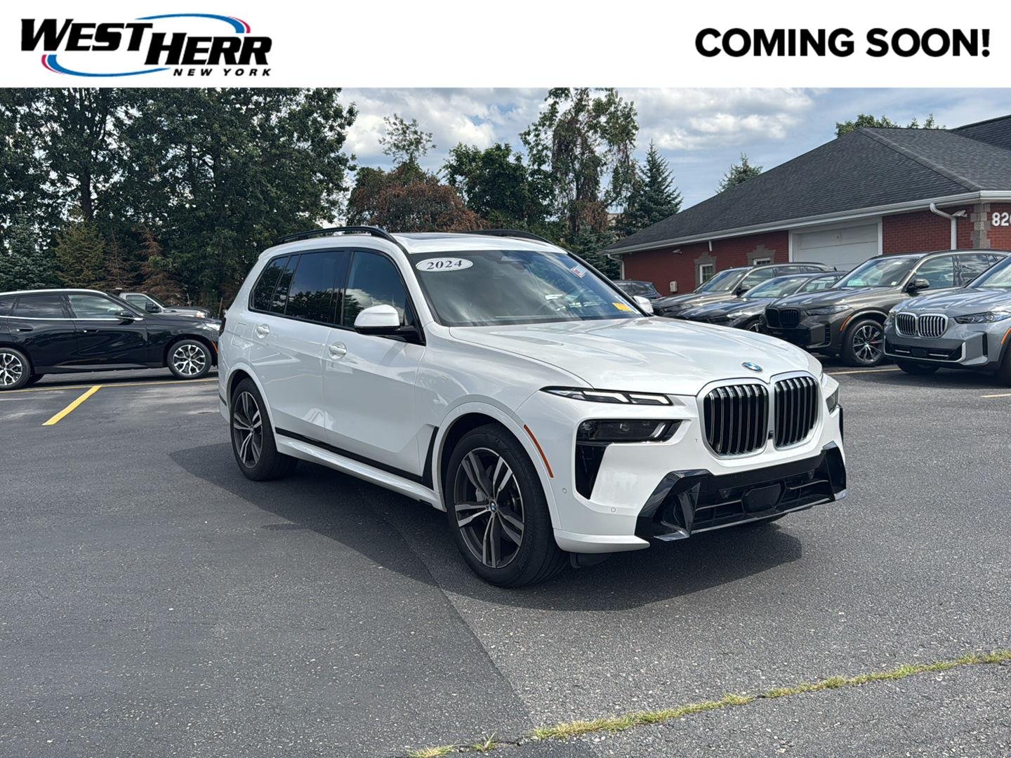 Used 2024 Mineral White Metallic BMW xDrive40i image 1