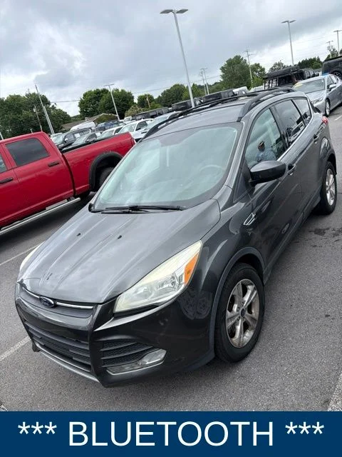Used 2016 Gray Ford SE image 1