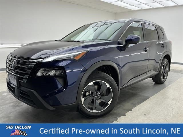 Used 2024 Deep Ocean Blue Pearl Nissan SV image 1