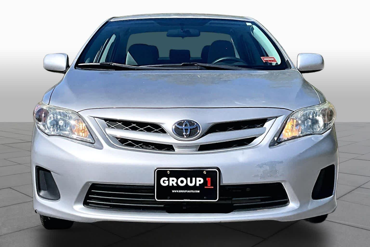 Used 2012 Classic Silver Metallic Toyota LE image 4