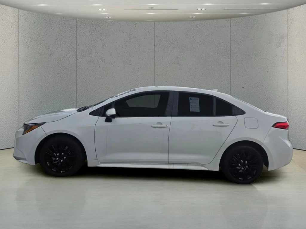 Used 2024 White Toyota LE image 2