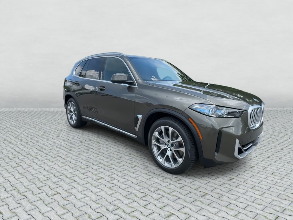 New 2026 Manhattan Green Metallic BMW xDrive50e image 2