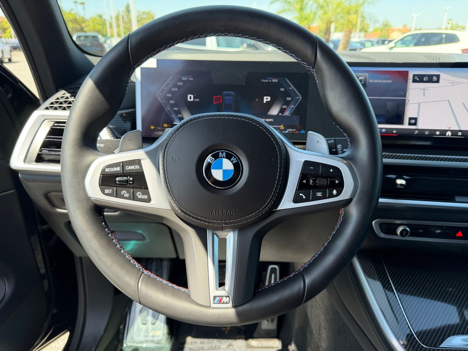 Used 2026 Black Sapphire Metallic BMW M60i image 28