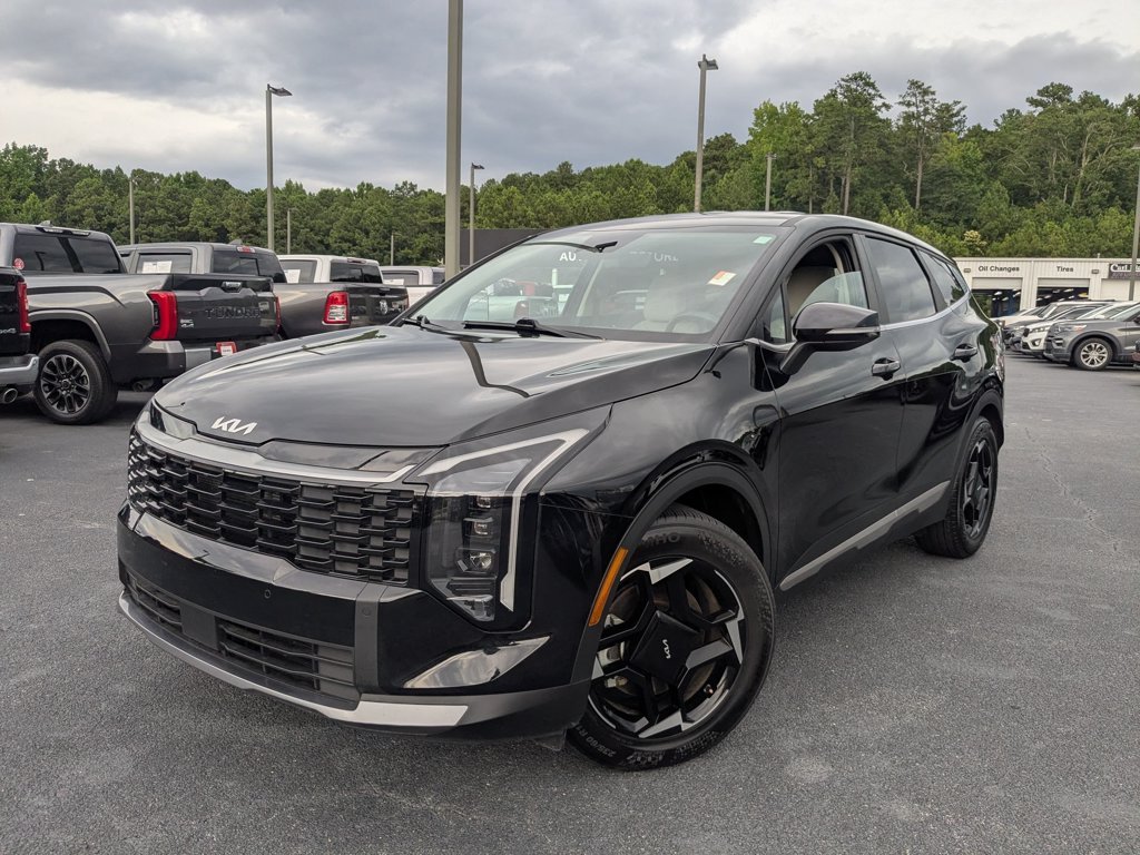 Used 2026 Ebony Black Kia EX image 1