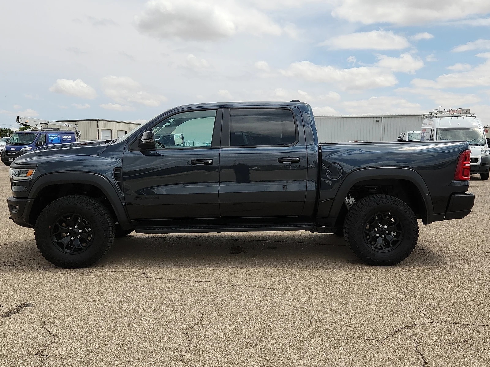 New 2026 Forged Blue Metallic  Paint Ram RHO CREW CAB 4X4 5