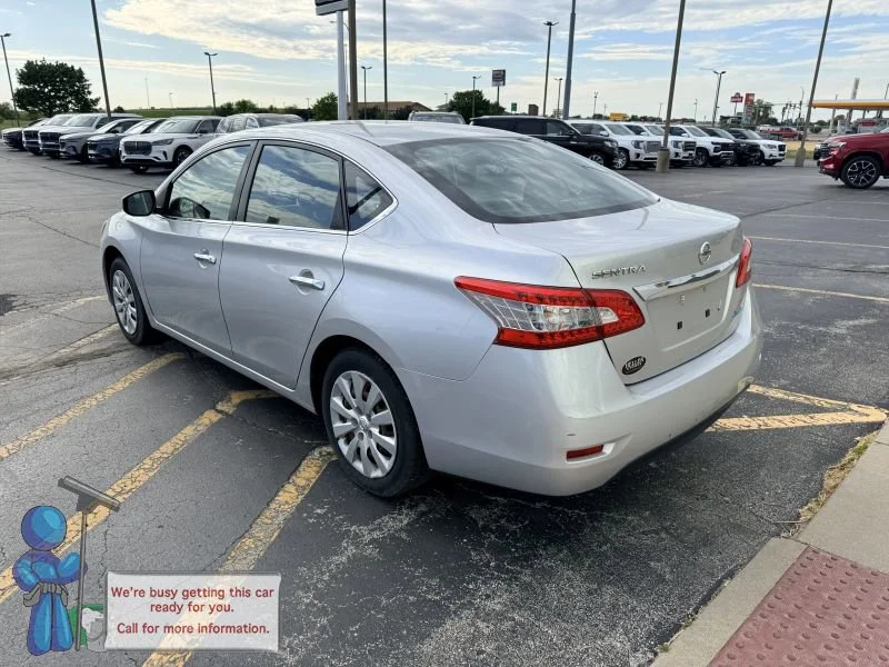 Used 2014 Brilliant Silver Nissan S image 3