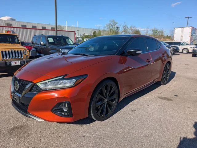 Used 2019 Orange Nissan Platinum image 3