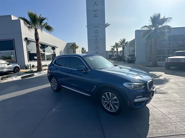 Used 2018 Blue BMW xDrive30i image 1