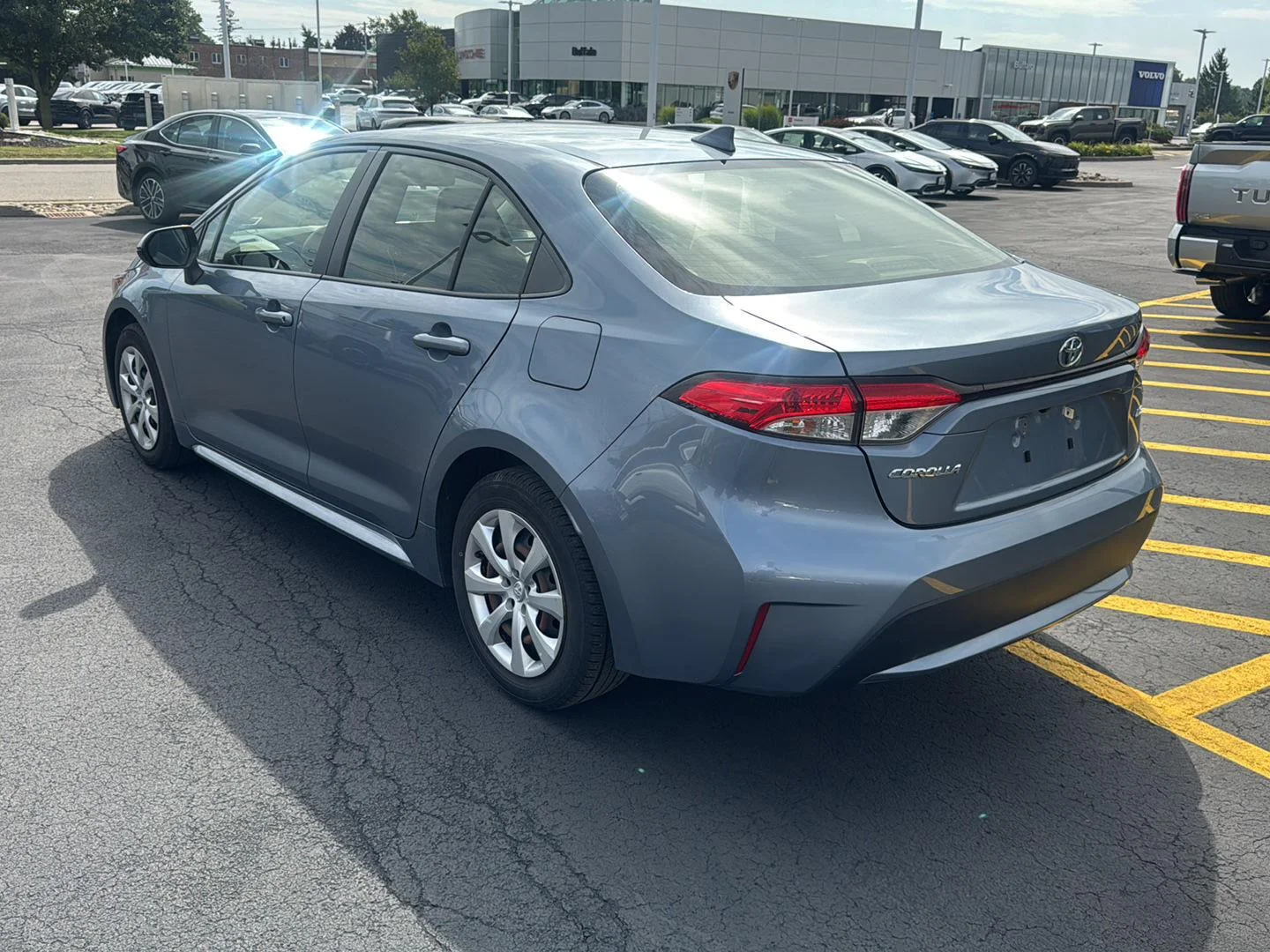 Used 2020 Celestite Gray Metallic Toyota LE image 4