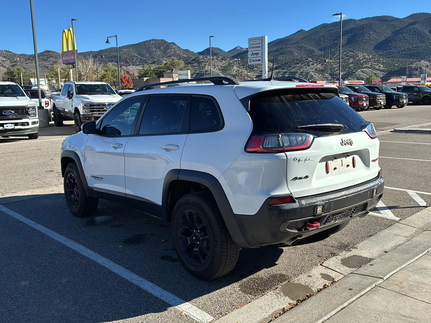Used 2019 Bright White Clearcoat Jeep Trailhawk Elite image 4