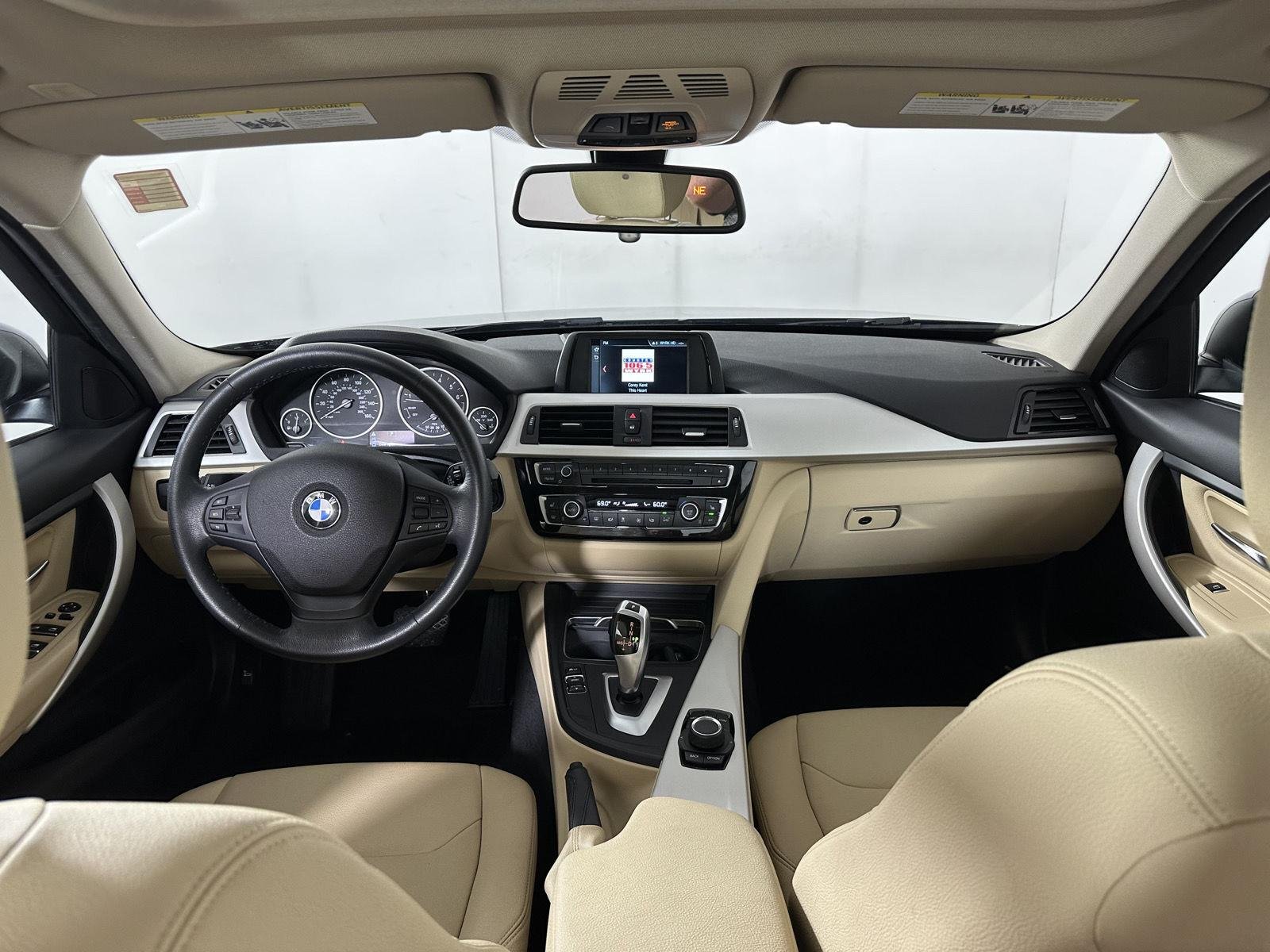 Used 2018 Mediterranean Blue Metallic BMW 320i xDrive image 40