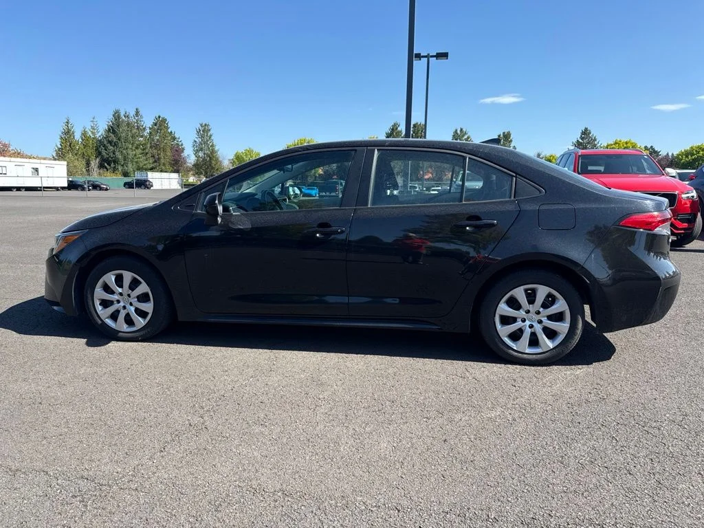 Used 2024 Midnight Black Metallic Toyota LE image 4