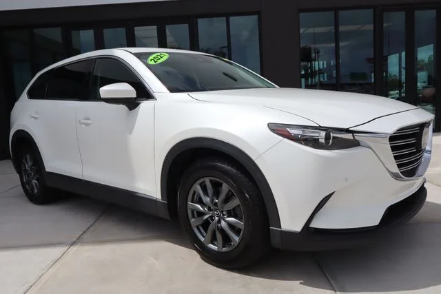 Used 2021 Snowflake White Pearl Mazda Touring image 1