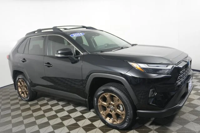 Used 2024 Midnight Black Metallic Toyota Woodland Edition image 1