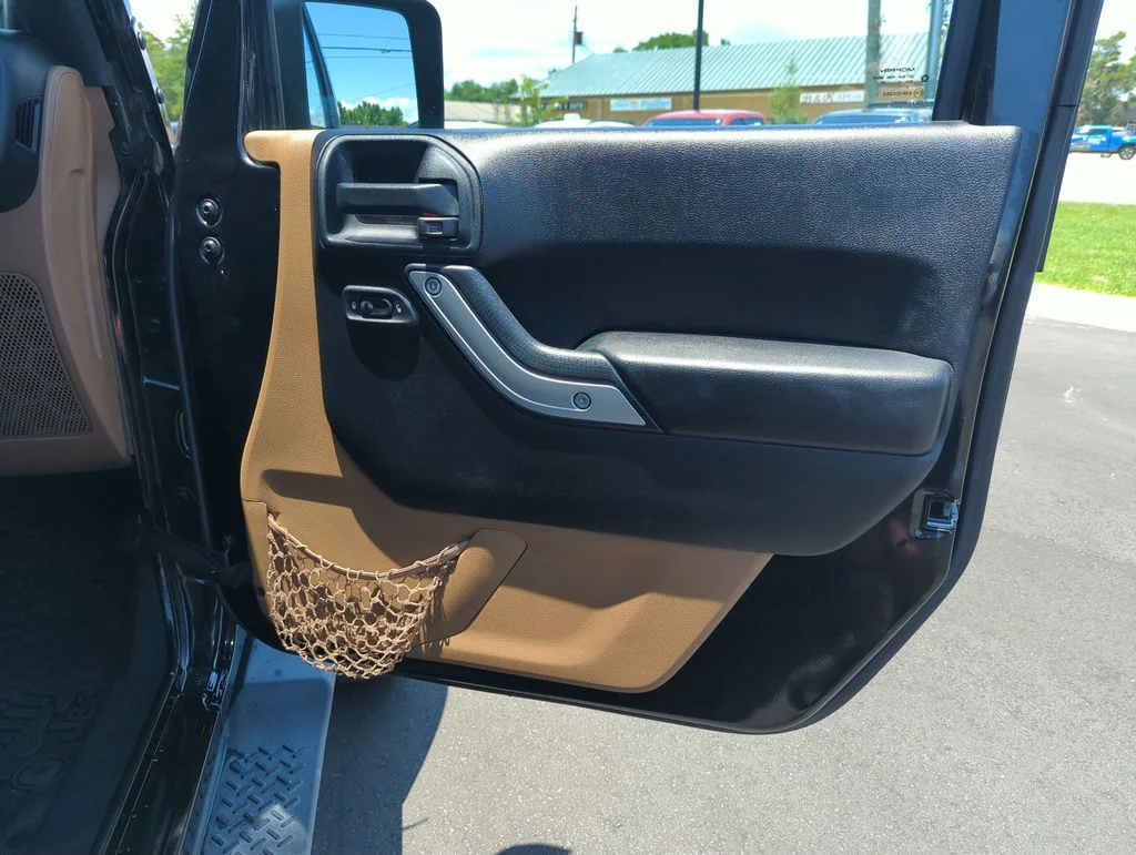 Used 2014 Black Jeep Unlimited Sahara image 30