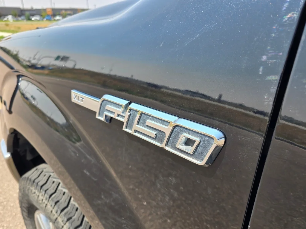 Used 2011 Tuxedo Black Metallic Ford XLT image 10