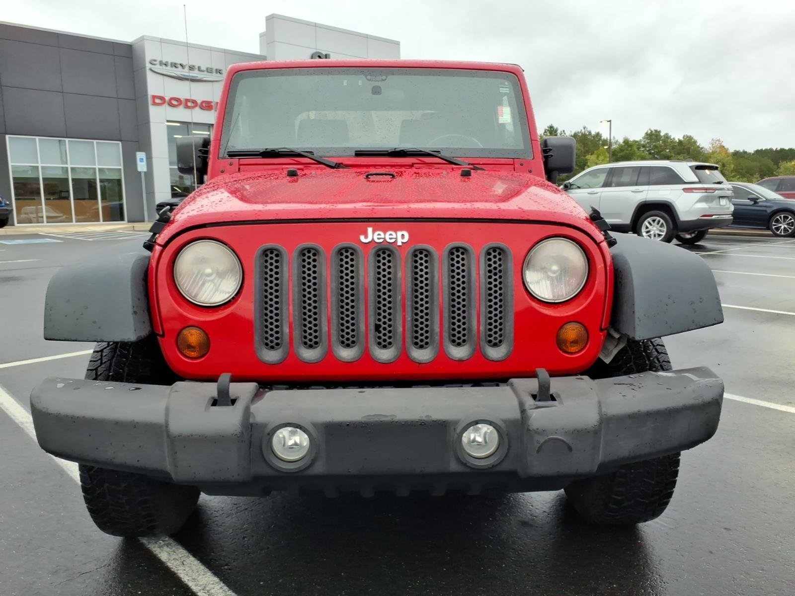 Used 2013 Flame Red Clearcoat Jeep Sport image 12