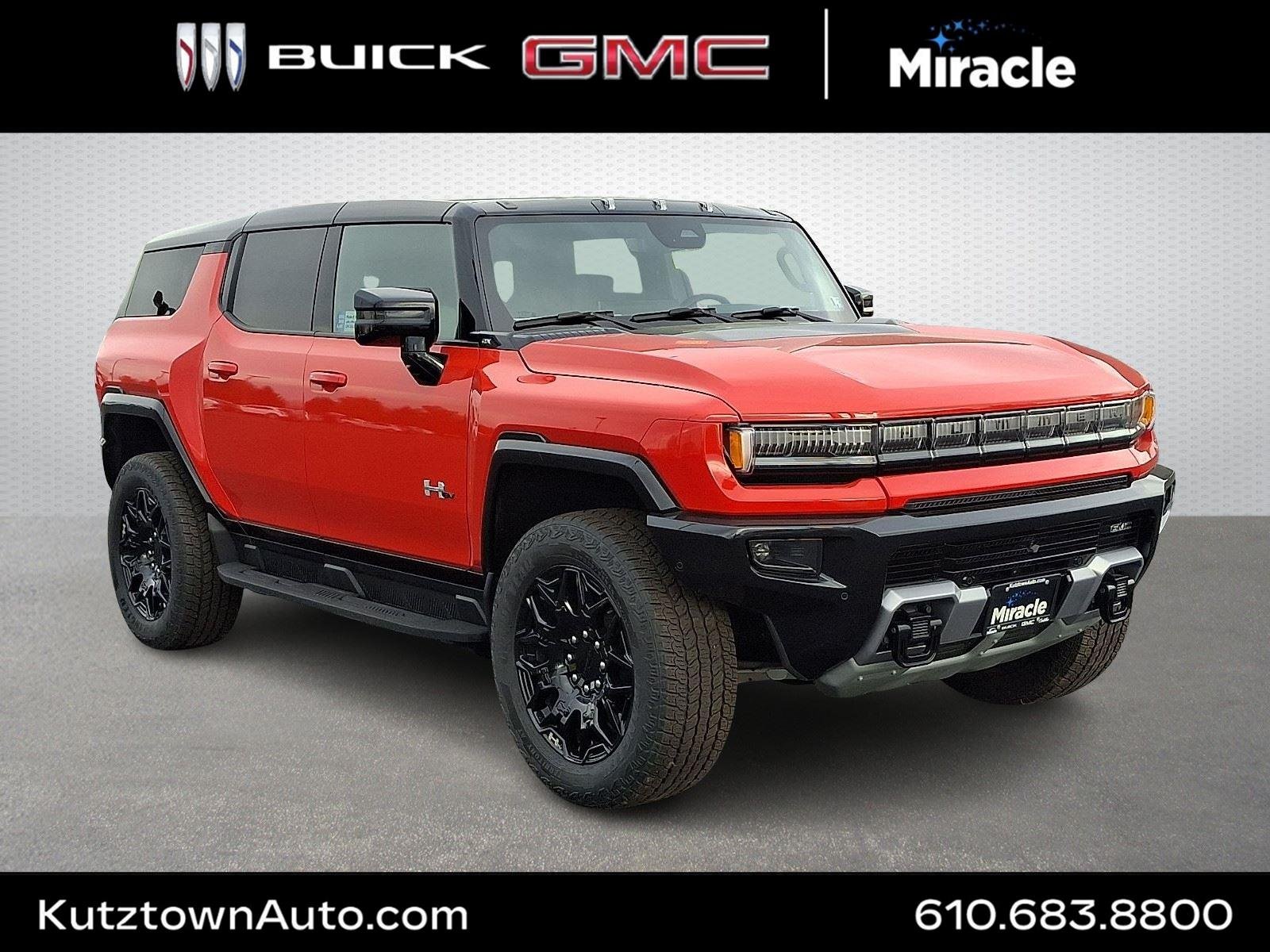 New 2026 Solar Orange GMC 2X image 1