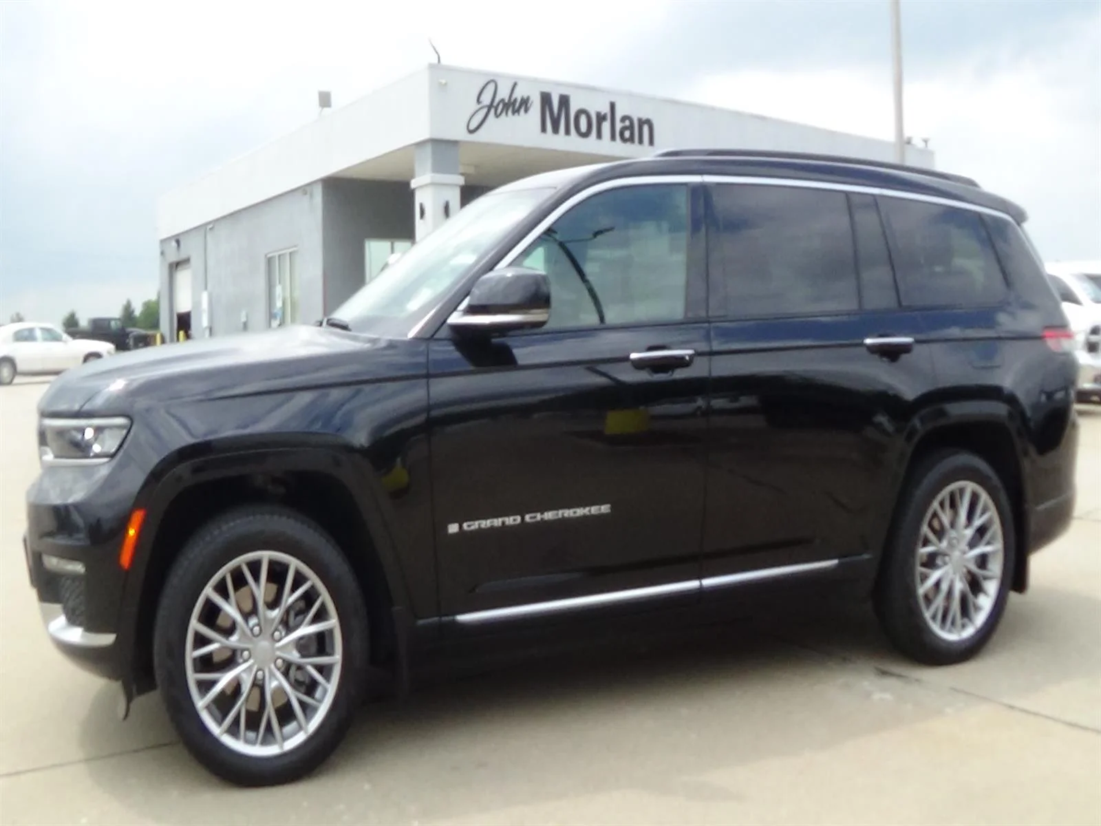 Used 2025 Diamond Black Crystal Pearl Coat (pxj) Jeep Summit image 1