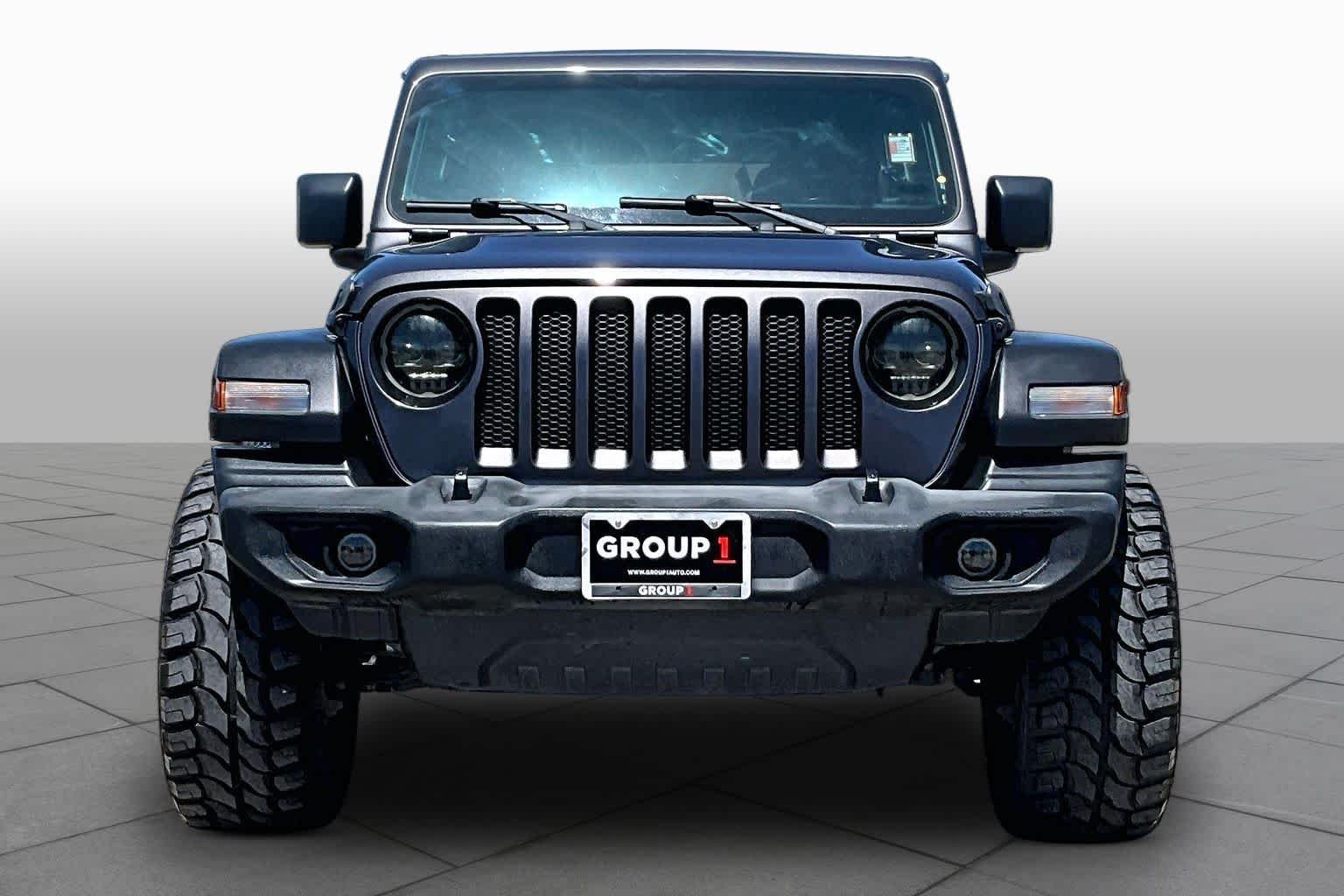 Used 2022 Granite Crystal Clearcoat Metallic Jeep Unlimited Sport S image 4