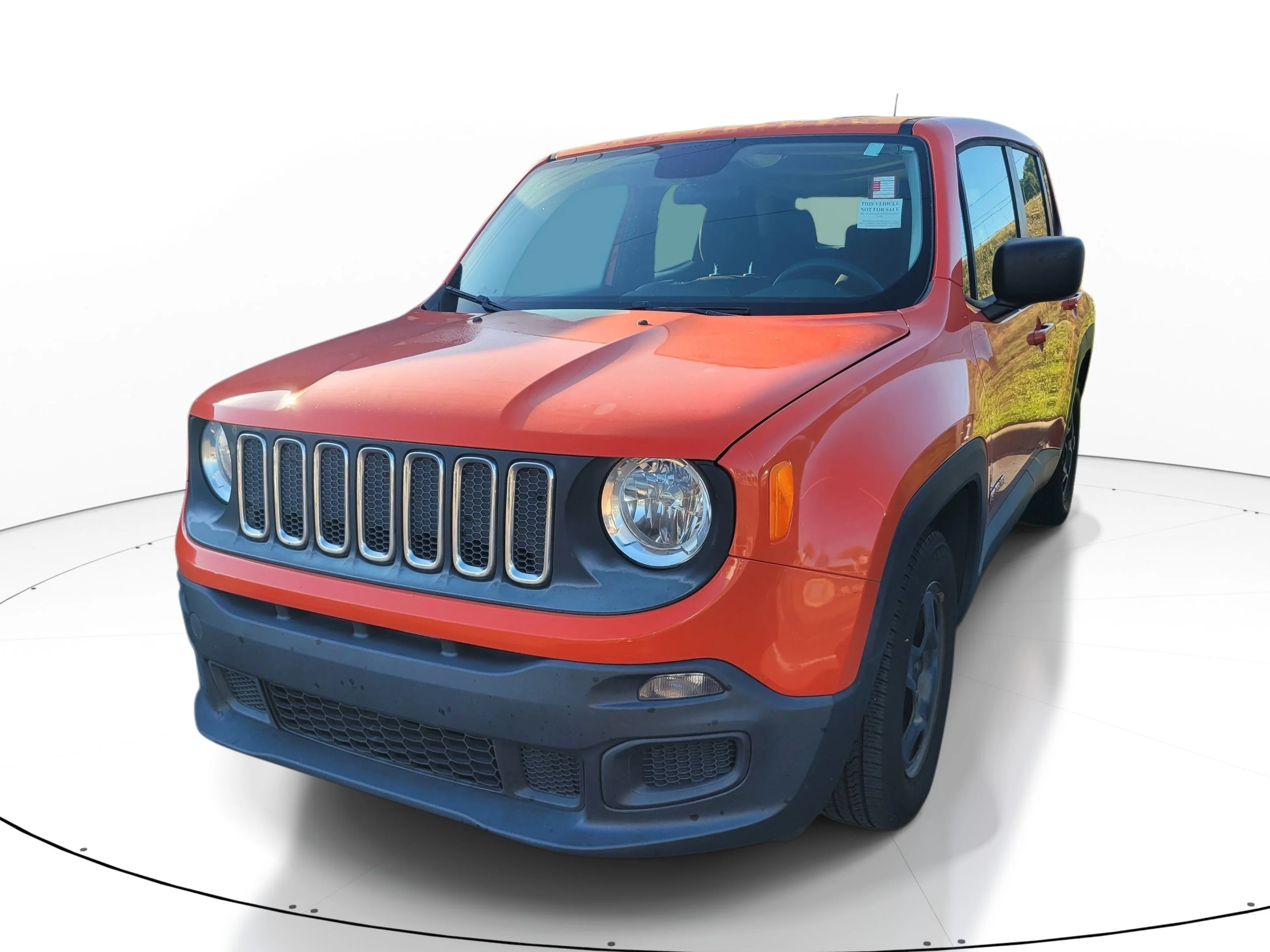 Used 2016 Omaha Orange Jeep Sport image 3