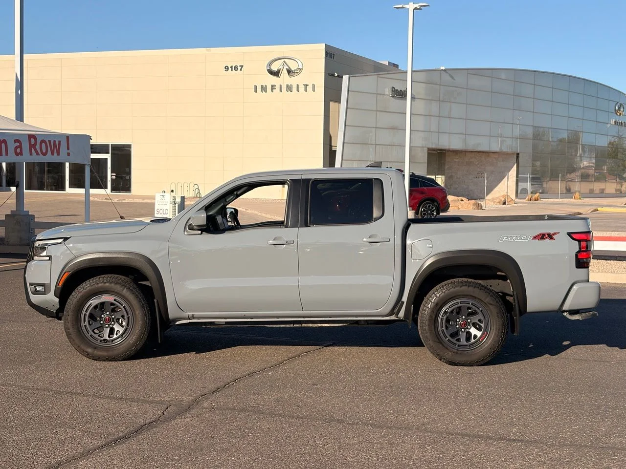 Used 2025 Boulder Gray Pearl Nissan PRO-4X image 2