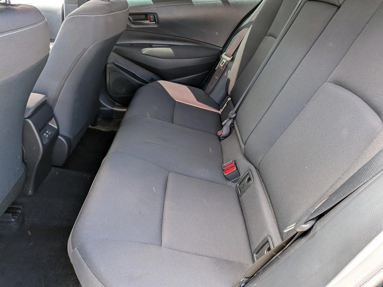 Used 2024 Midnight Black Metallic Toyota Hybrid LE image 17