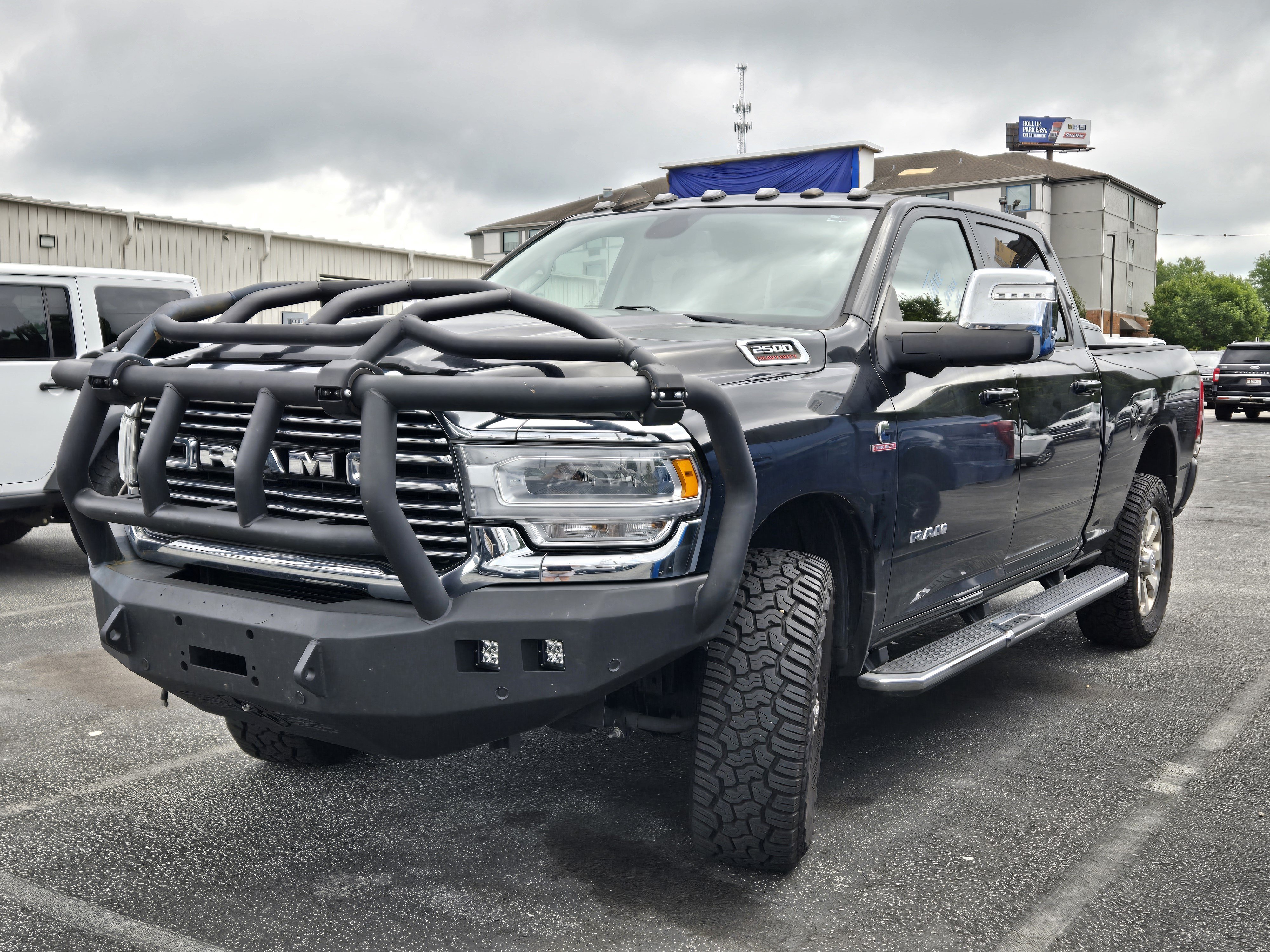 Used 2023 Diamond Black Crystal Pearlcoat Ram Laramie image 1