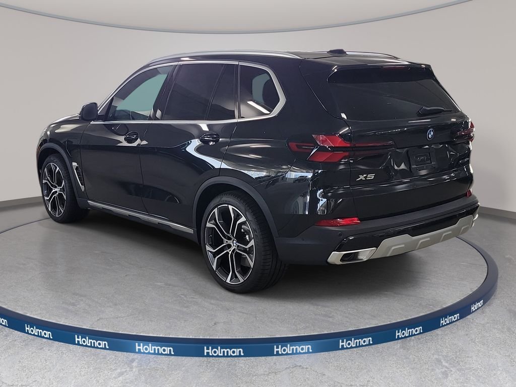 New 2026 Black Sapphire Metallic BMW xDrive50e image 7