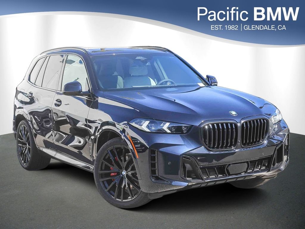 Used 2026 Carbon Black Metallic BMW sDrive40i image 1