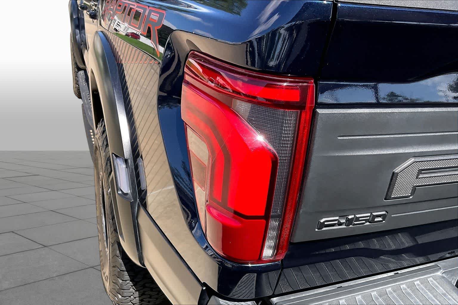 Used 2024 Antimatter Blue Metallic Ford Raptor image 28