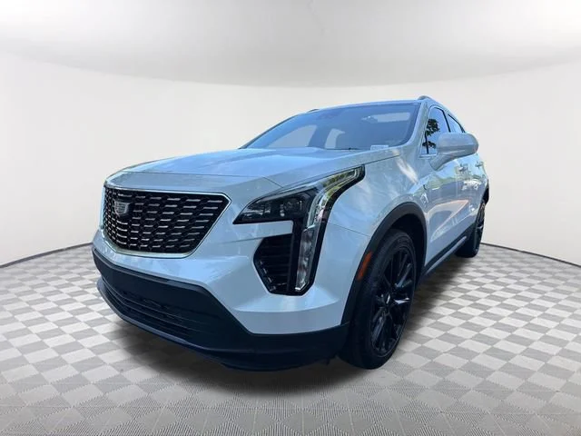 Used 2023 CRYSTAL WHITE TRICOAT Cadillac FWD Luxury image 1