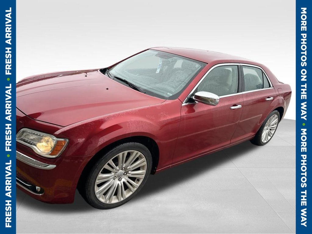 Used 2012 Red Chrysler Limited image 1