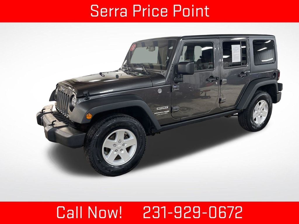 Used 2018 Gray Jeep Unlimited Sport image 1