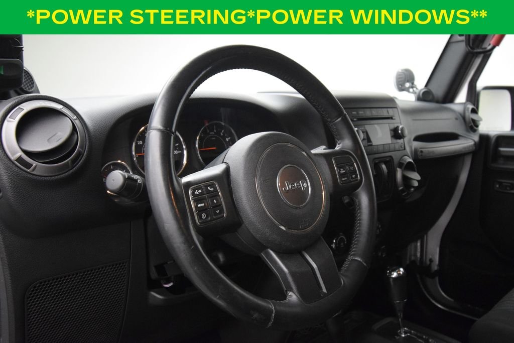 Used 2012 Bright Silver Metallic Clearcoat Jeep Sport image 10