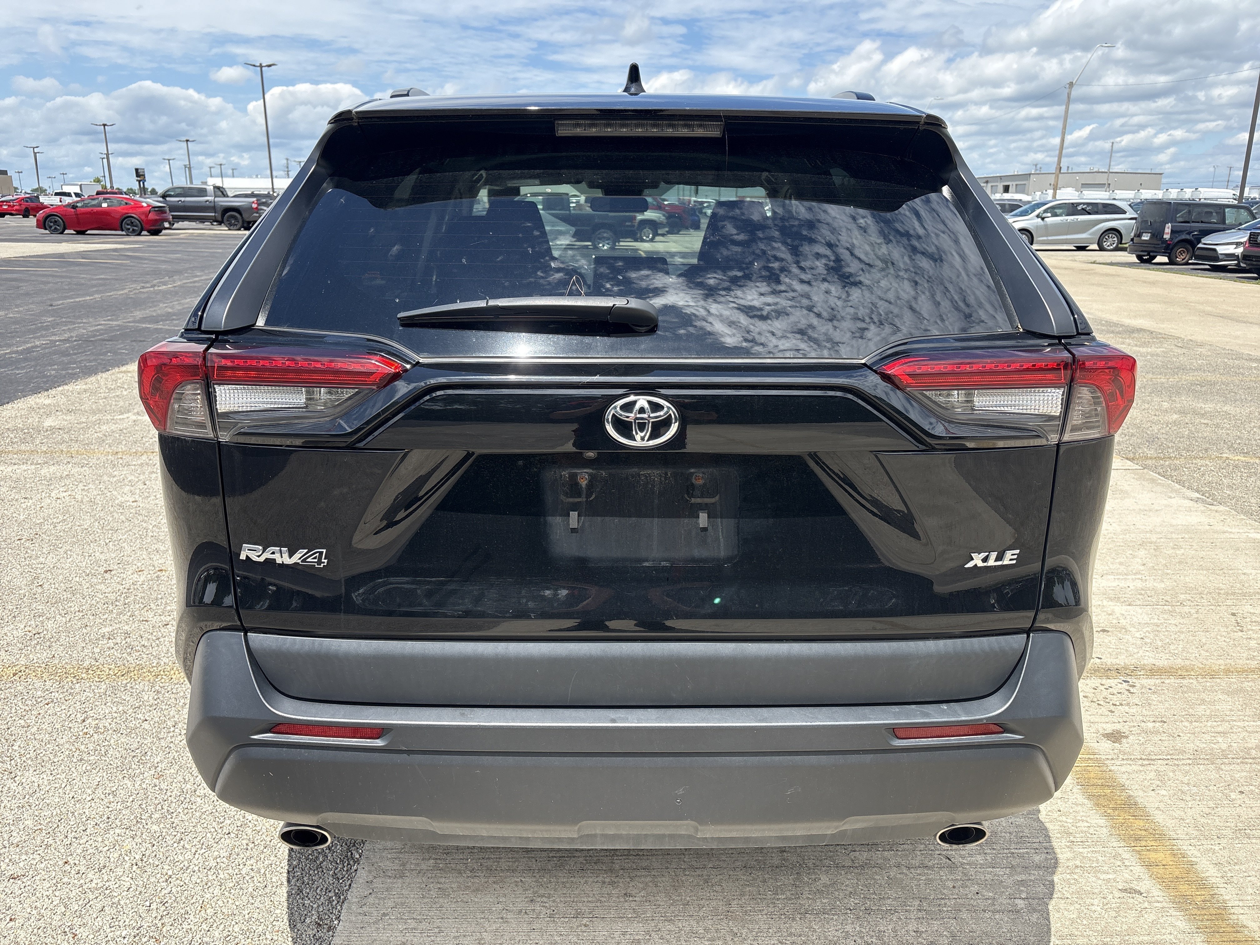 Used 2024 Midnight Black Metallic Toyota XLE image 4