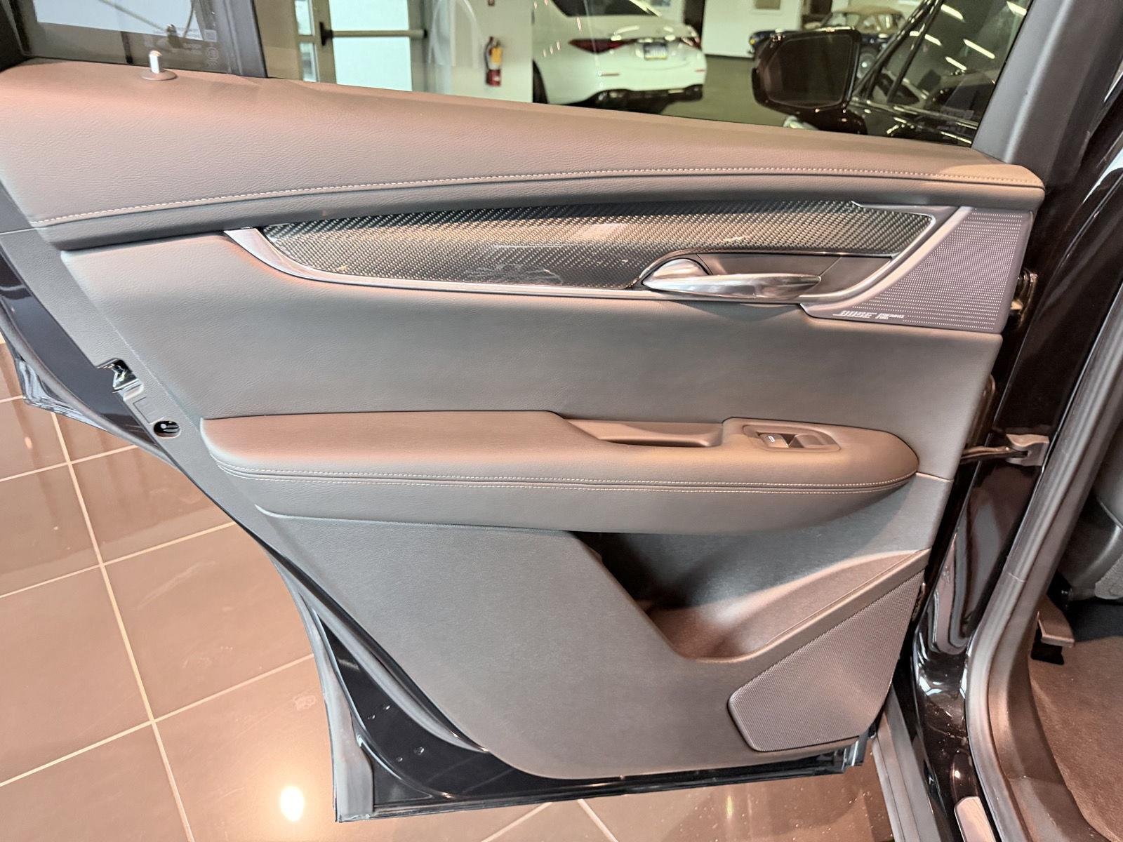 Used 2024 Stellar Black Metallic Cadillac Sport image 21