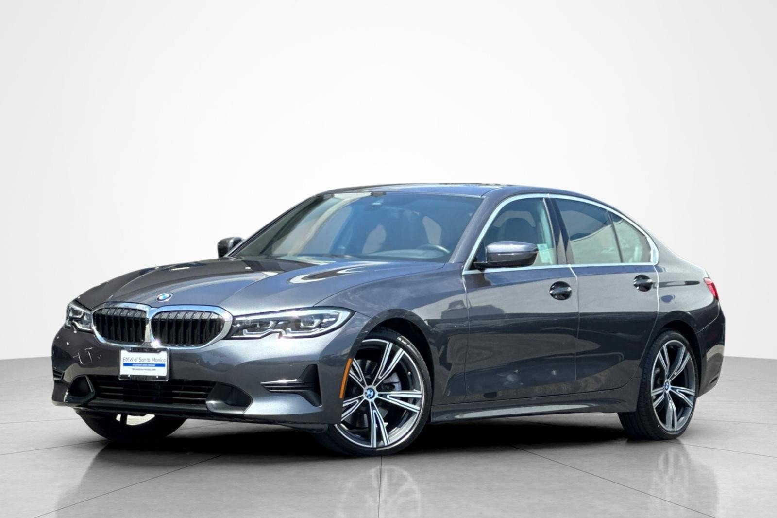 Used 2021 Mineral Gray Metallic BMW 330i image 1