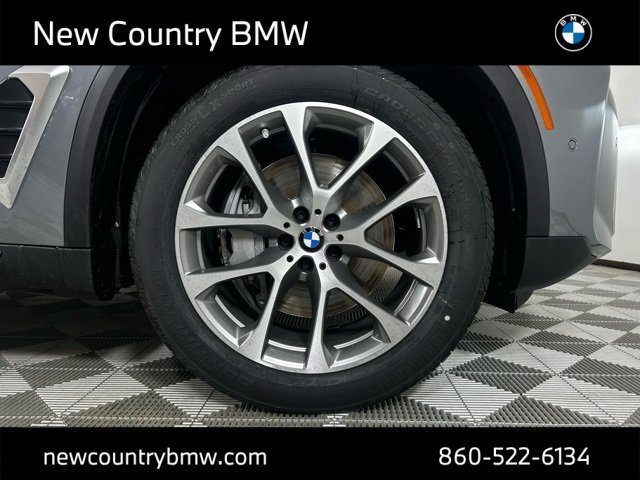 Used 2026 Skyscraper Grey Metallic BMW xDrive50e image 8